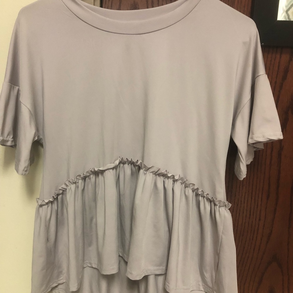 Peplum sheer top
